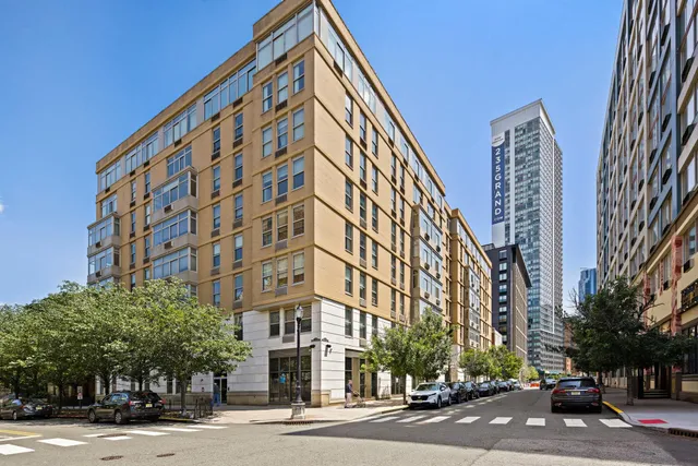 a view of a building with a street