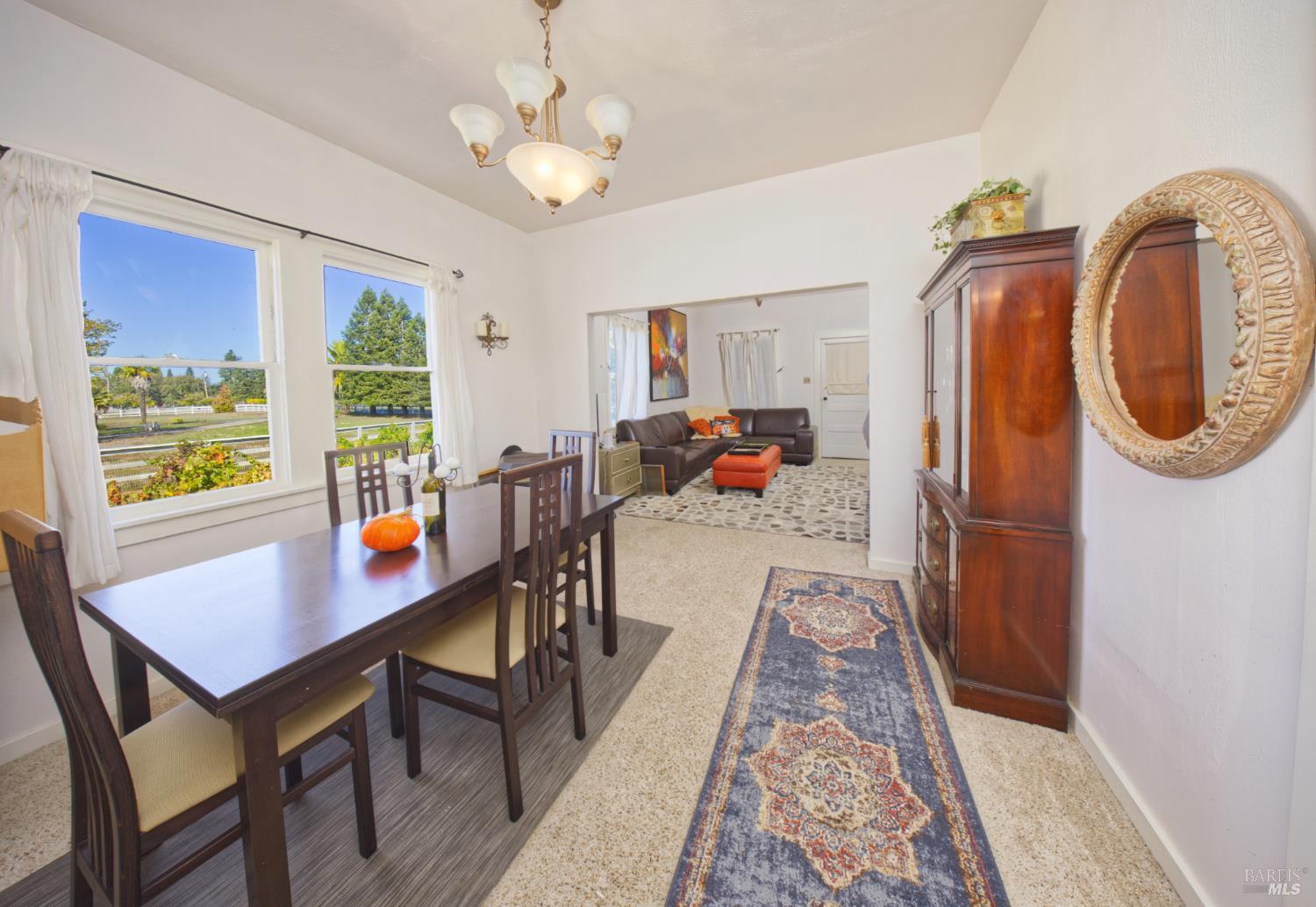 1623 Willowside Road Santa Rosa, CA 95401 - Photo 12 of 47 a view of a dining room with furniture window and wooden floor
