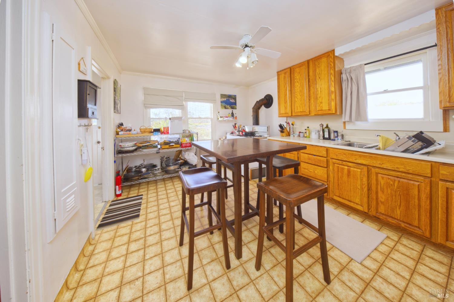1623 Willowside Road Santa Rosa, CA 95401 - Photo 20 of 47 a view of a kitchen and dining area a chandelier