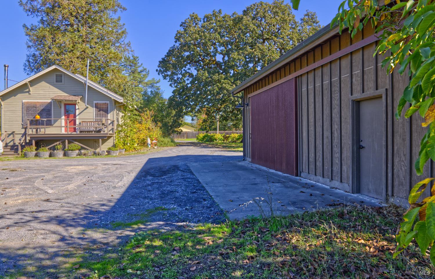 1623 Willowside Road Santa Rosa, CA 95401 - Photo 24 of 47 a view of a house with a yard and pathway