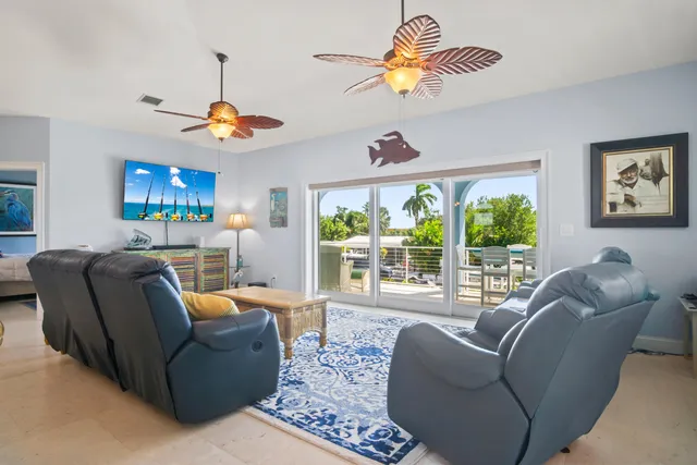 a patio with table and chairs