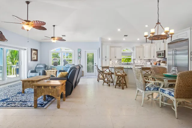 a kitchen with kitchen island granite countertop wooden cabinets and counter space