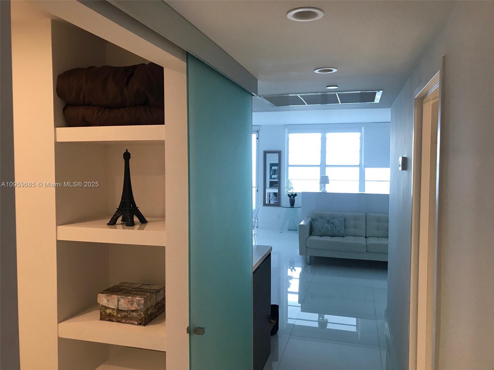 100 Lincoln Road, Unit 719 Miami Beach, FL 33139 - Photo 11 of 50 a living room with furniture and a window