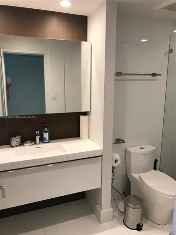 a bathroom with a sink and a toilet