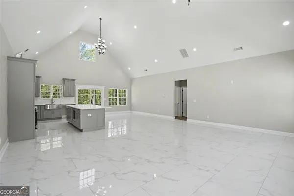 a view of a kitchen with a sink cabinets and window
