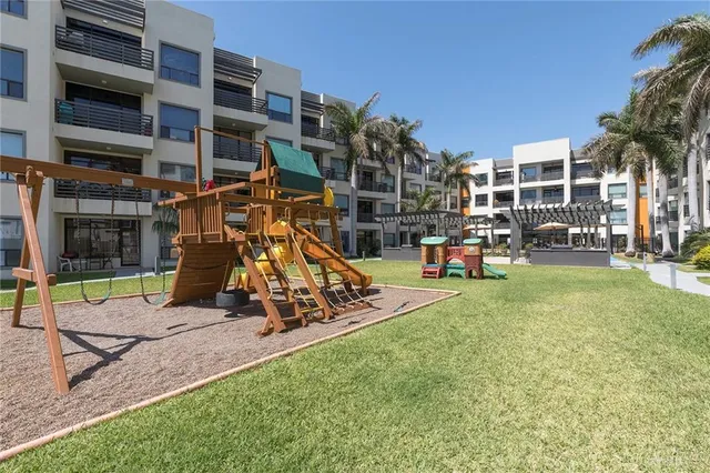 a view of a building with a park