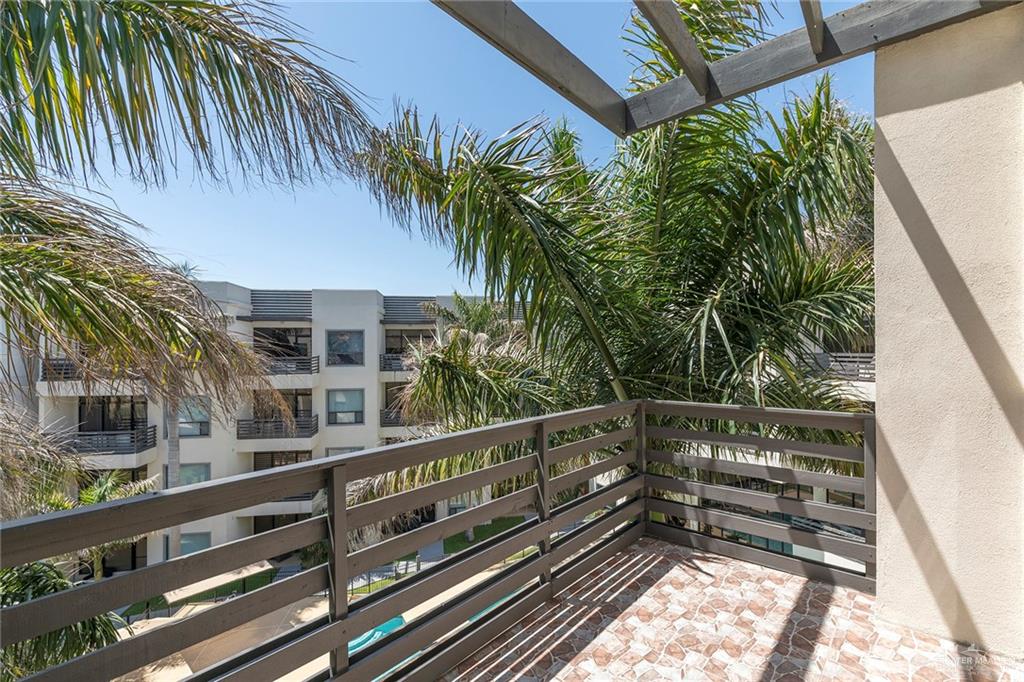 813 Travis Street, Unit 416 Mission, TX 78572 - Photo 19 of 32 a view of balcony with small garden