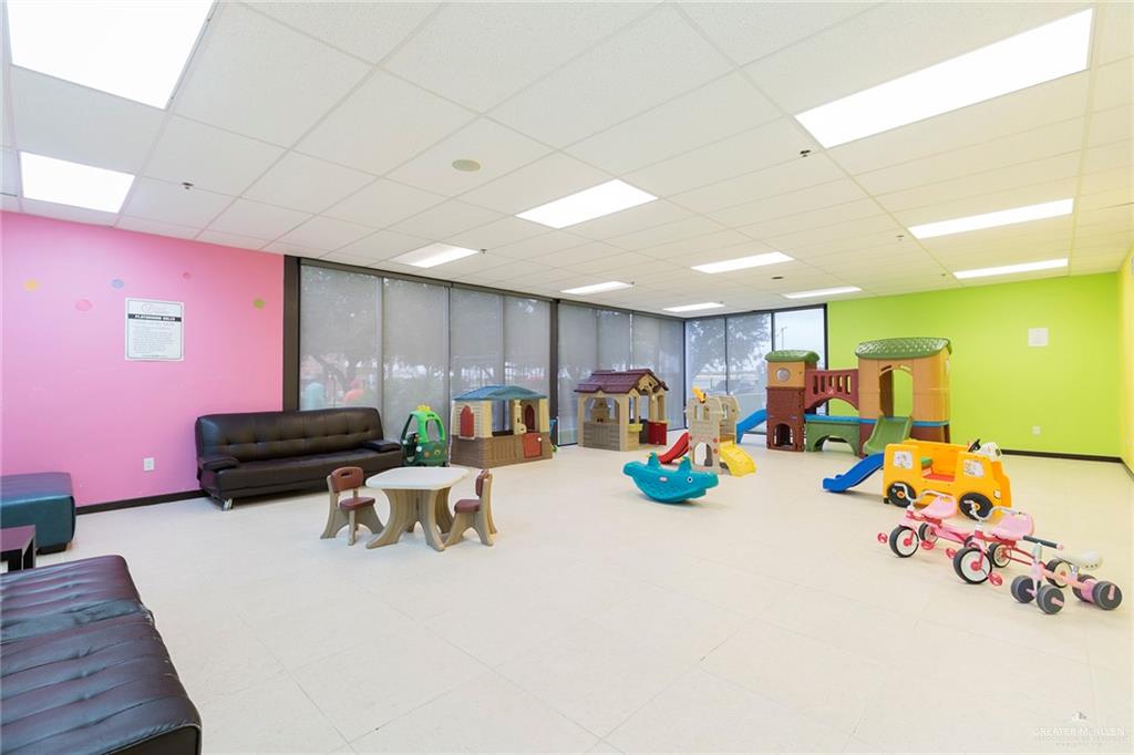 813 Travis Street, Unit 416 Mission, TX 78572 - Photo 23 of 32 a view of a room with gym equipment