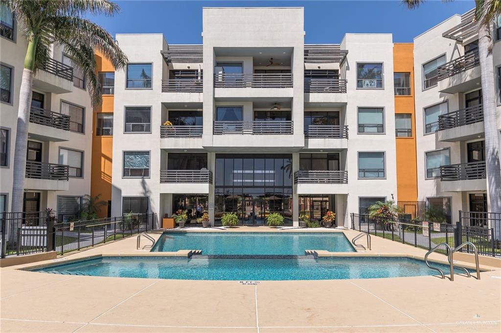 813 Travis Street, Unit 416 Mission, TX 78572 - Photo 3 of 32 a front view of a building with street