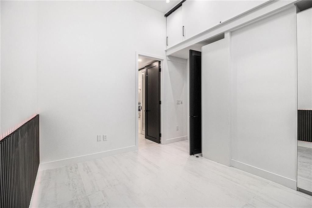 199 14th Street Northeast, Unit 103 Atlanta, GA 30309 - Photo 15 of 32 a view of closet area