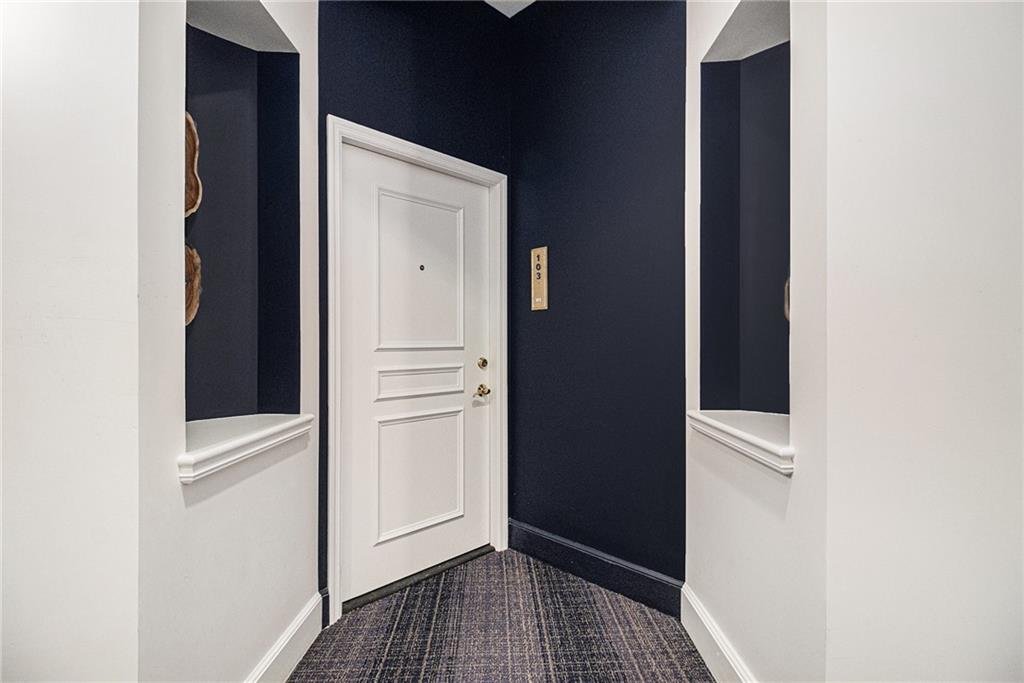 199 14th Street Northeast, Unit 103 Atlanta, GA 30309 - Photo 30 of 32 a view of walk in closet