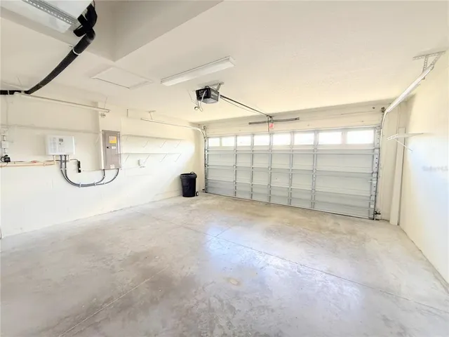 a view of a room with cabinet and mirrors