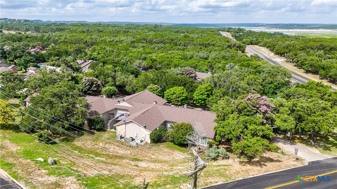 8 Oak Villa Road, Unit G2 Canyon Lake, TX 78133 - Photo 15 of 17 an aerial view of a house