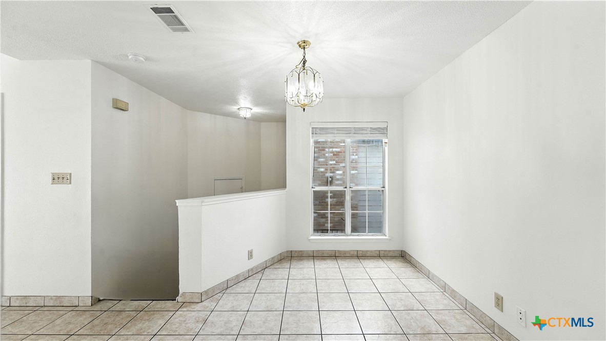 8 Oak Villa Road, Unit G2 Canyon Lake, TX 78133 - Photo 6 of 17 a view of an empty room with a window
