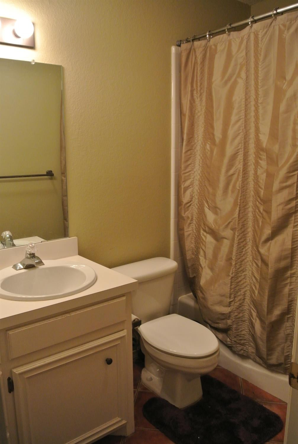 6219 8th Street Lubbock, TX 79416 - Photo 10 of 12 Hallway bathroom
