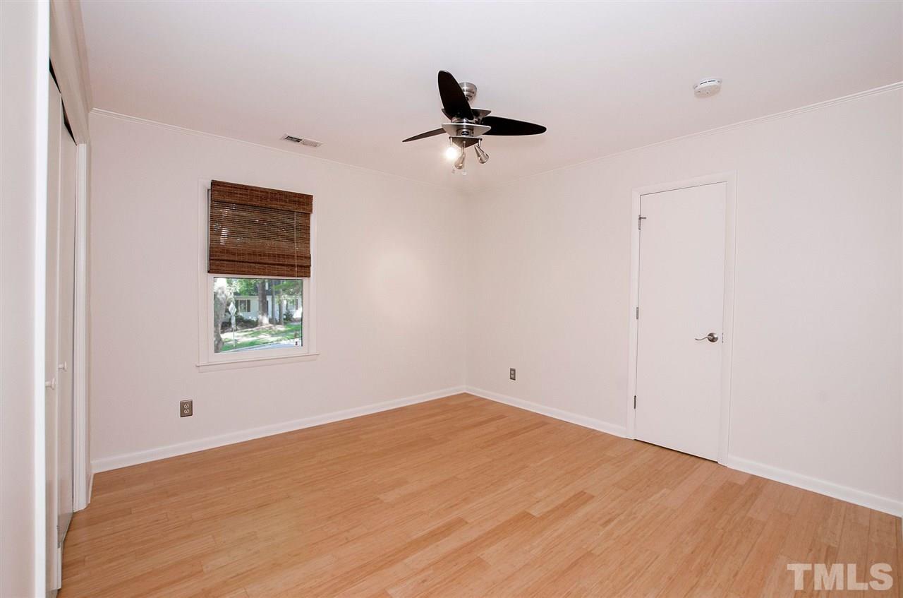 6205 Lookout Loop Raleigh, NC 27612 - Photo 14 of 25 a view of empty room with ceiling fan