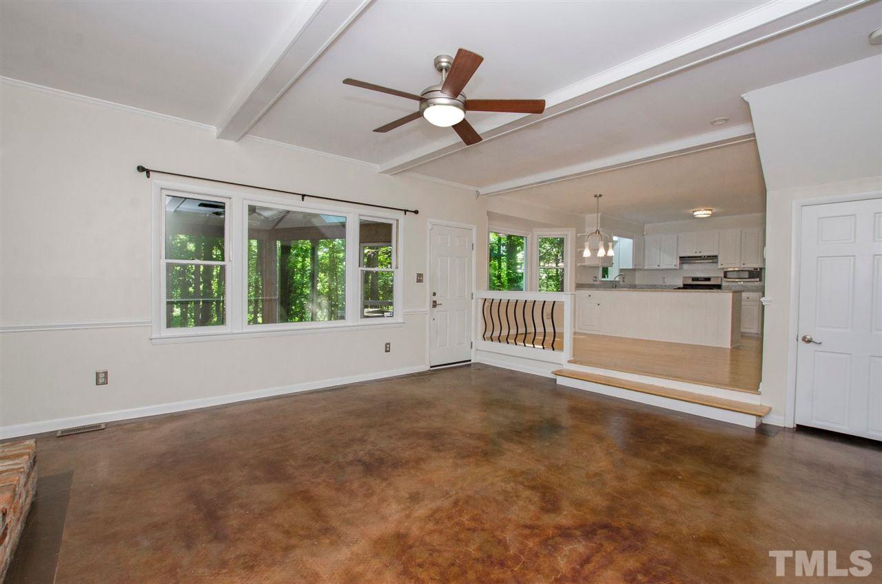 6205 Lookout Loop Raleigh, NC 27612 - Photo 7 of 25 a view of an empty room with a window