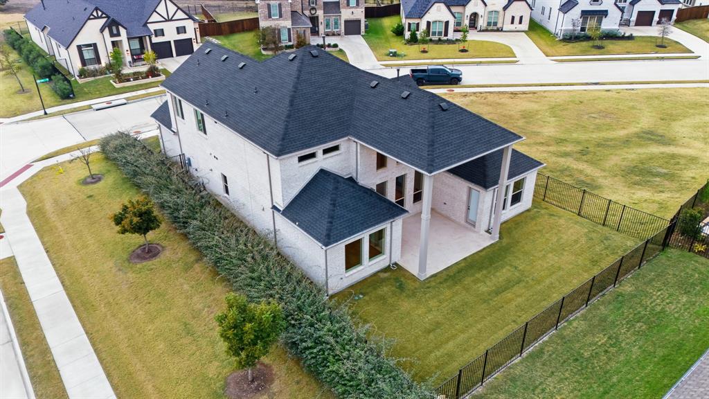 1902 Pebble Lane Rockwall, TX 75087 - Photo 2 of 35 an aerial view of residential houses with outdoor space