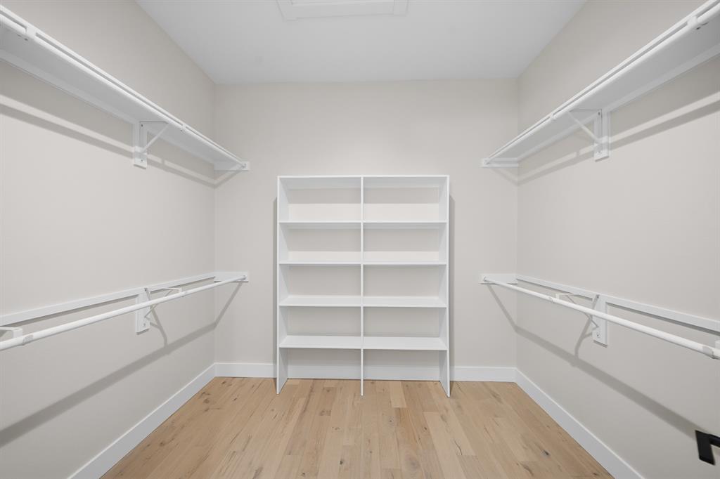 1902 Pebble Lane Rockwall, TX 75087 - Photo 31 of 35 a view of an empty walk in closet