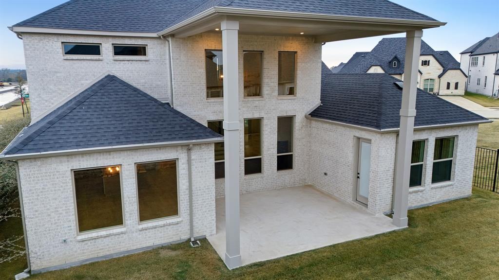 1902 Pebble Lane Rockwall, TX 75087 - Photo 34 of 35 a view of a house with backyard