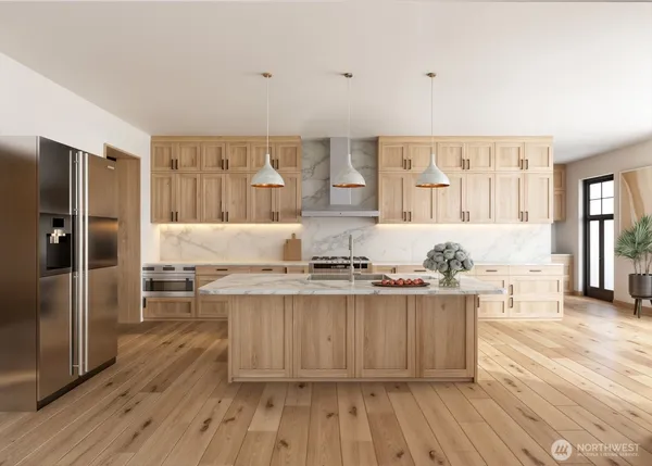 a kitchen with stainless steel appliances granite countertop a stove and cabinets