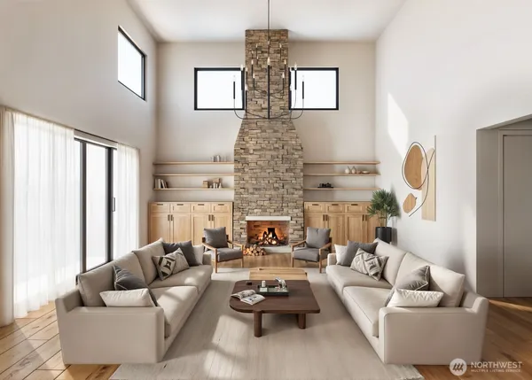 a living room with furniture and a chandelier