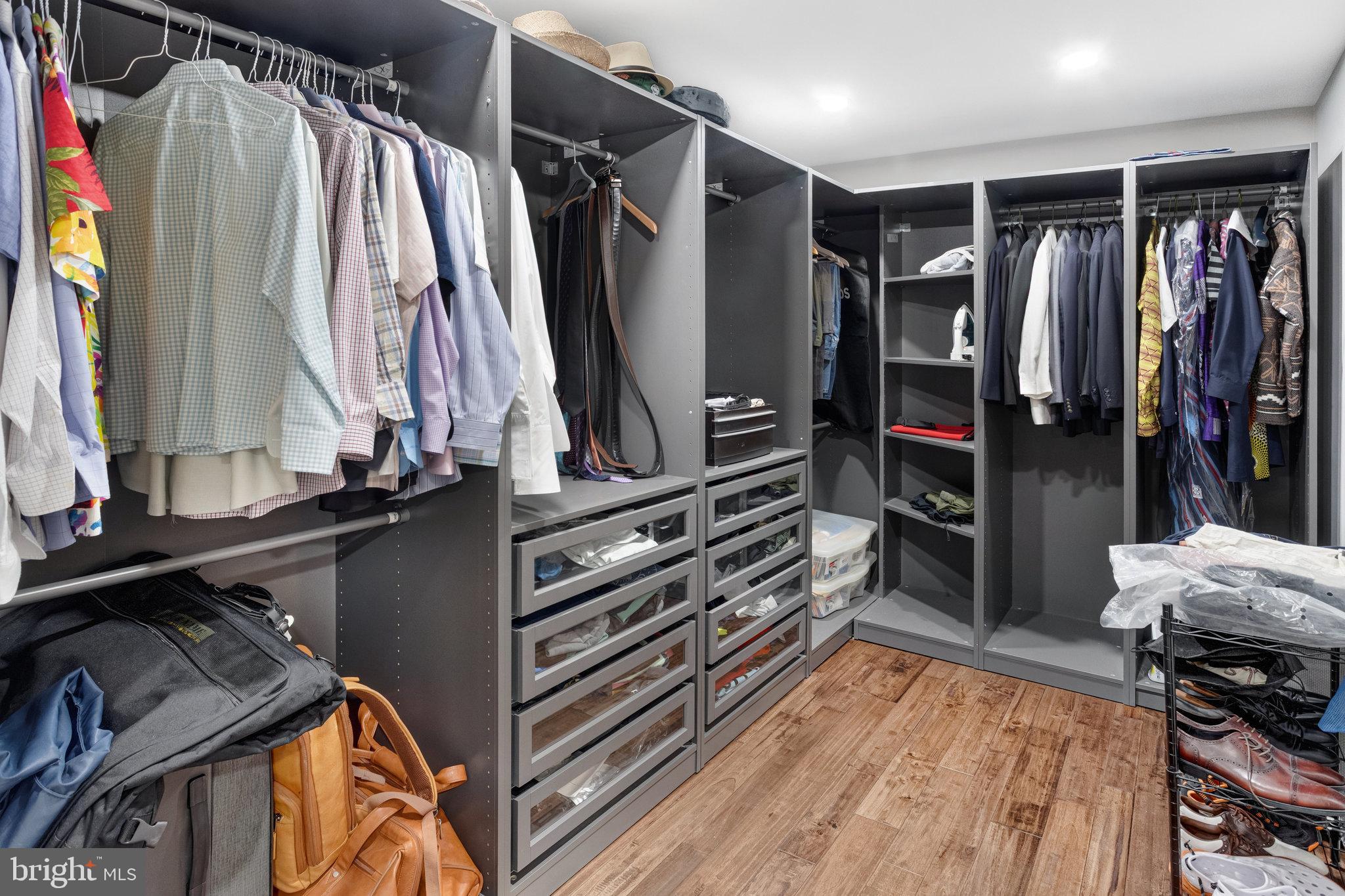4586 Rincon Place Dumfries, VA 22025 - Photo 22 of 46 a view of walk in closet with clothes and shoes