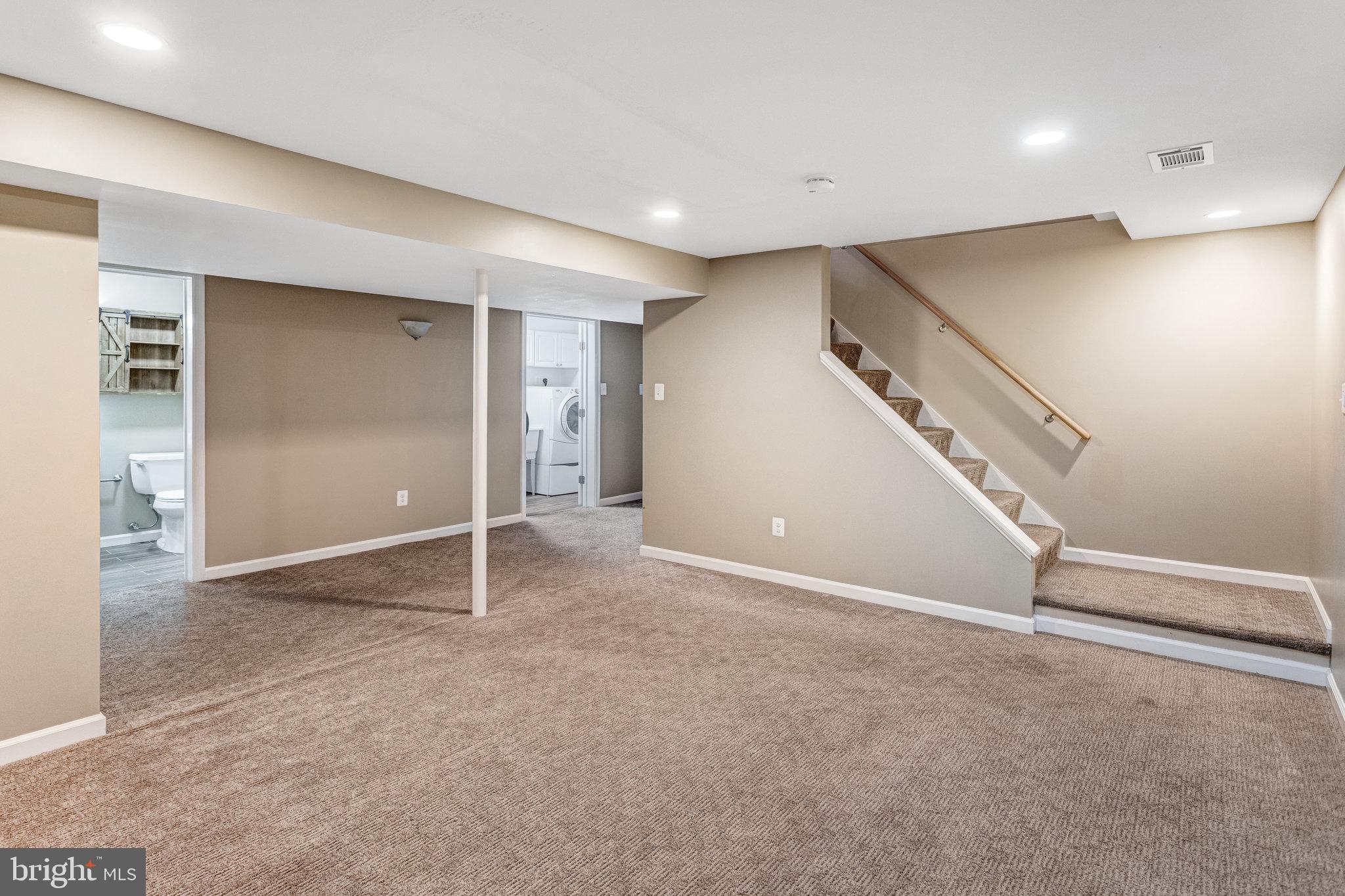 4586 Rincon Place Dumfries, VA 22025 - Photo 34 of 46 a view of an empty room with stairs
