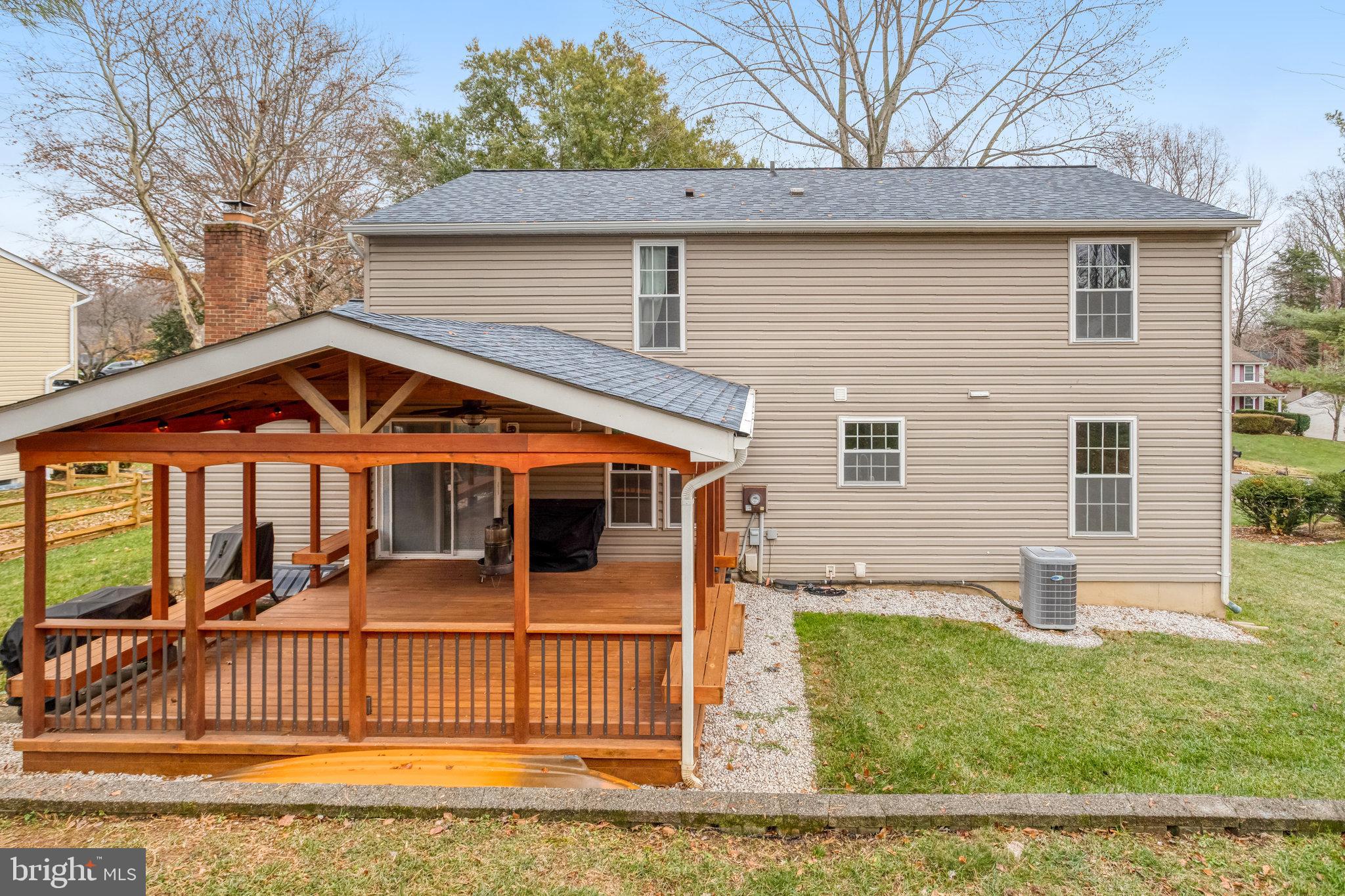 4586 Rincon Place Dumfries, VA 22025 - Photo 44 of 46 a front view of a house with garden