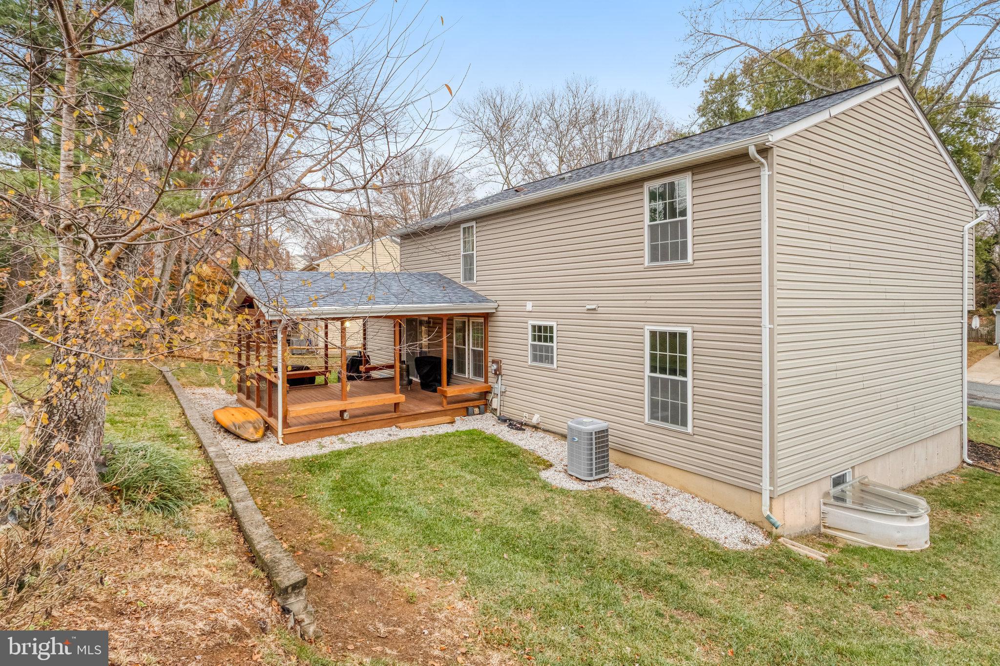 4586 Rincon Place Dumfries, VA 22025 - Photo 45 of 46 a view of a house with backyard
