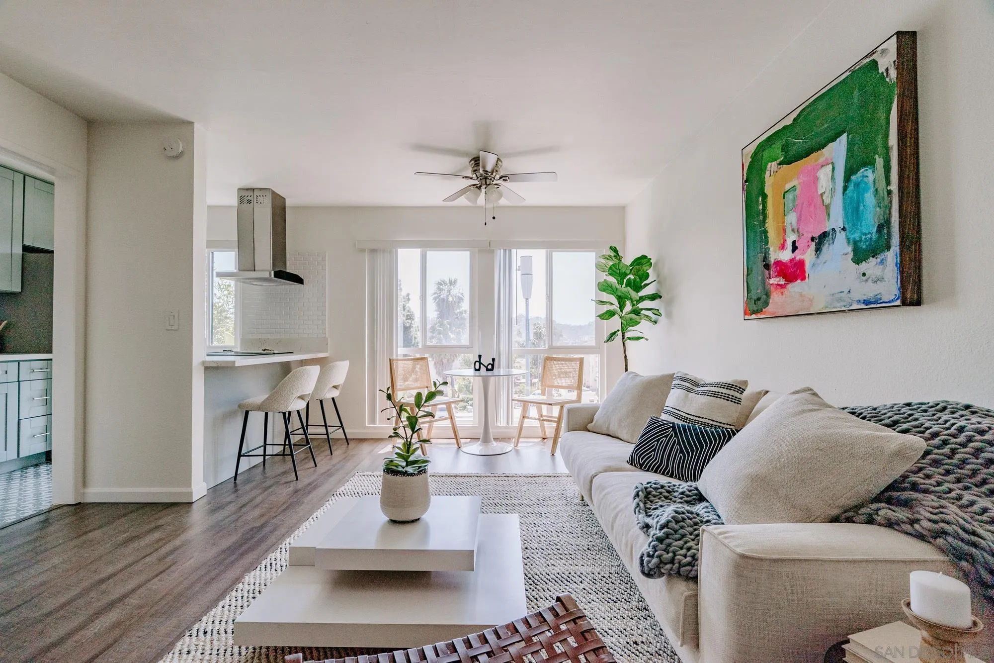 6780 Friars Road, Unit 346 San Diego, CA 92108 - Photo 11 of 29 a living room with furniture and a large window