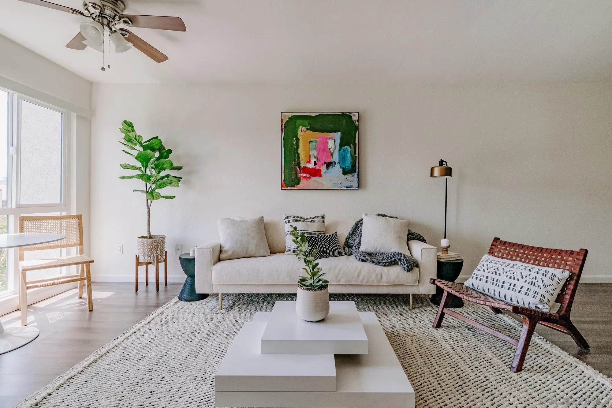 6780 Friars Road, Unit 346 San Diego, CA 92108 - Photo 13 of 29 a living room with furniture and wooden floor