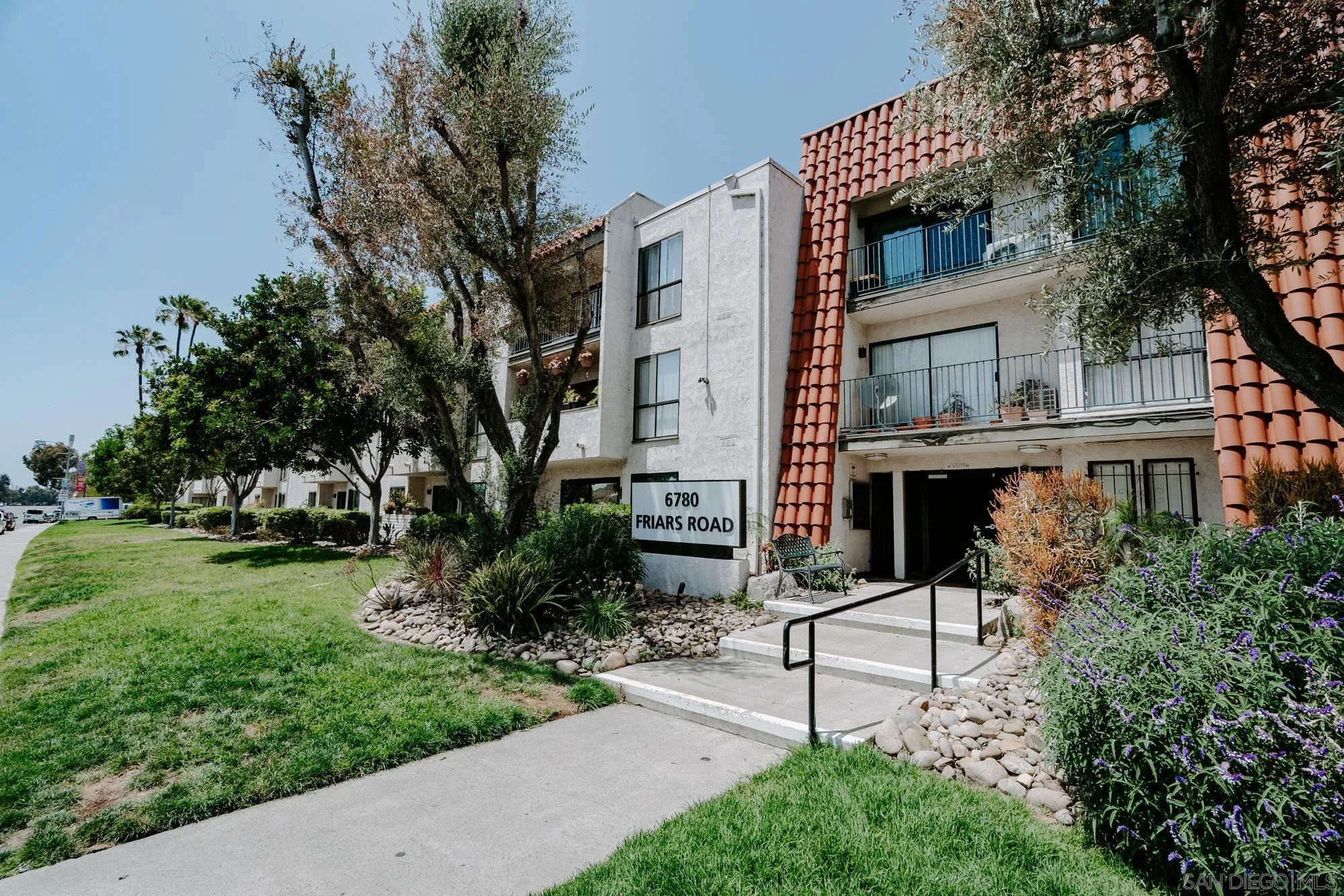 6780 Friars Road, Unit 346 San Diego, CA 92108 - Photo 20 of 29 a building with trees in front of it