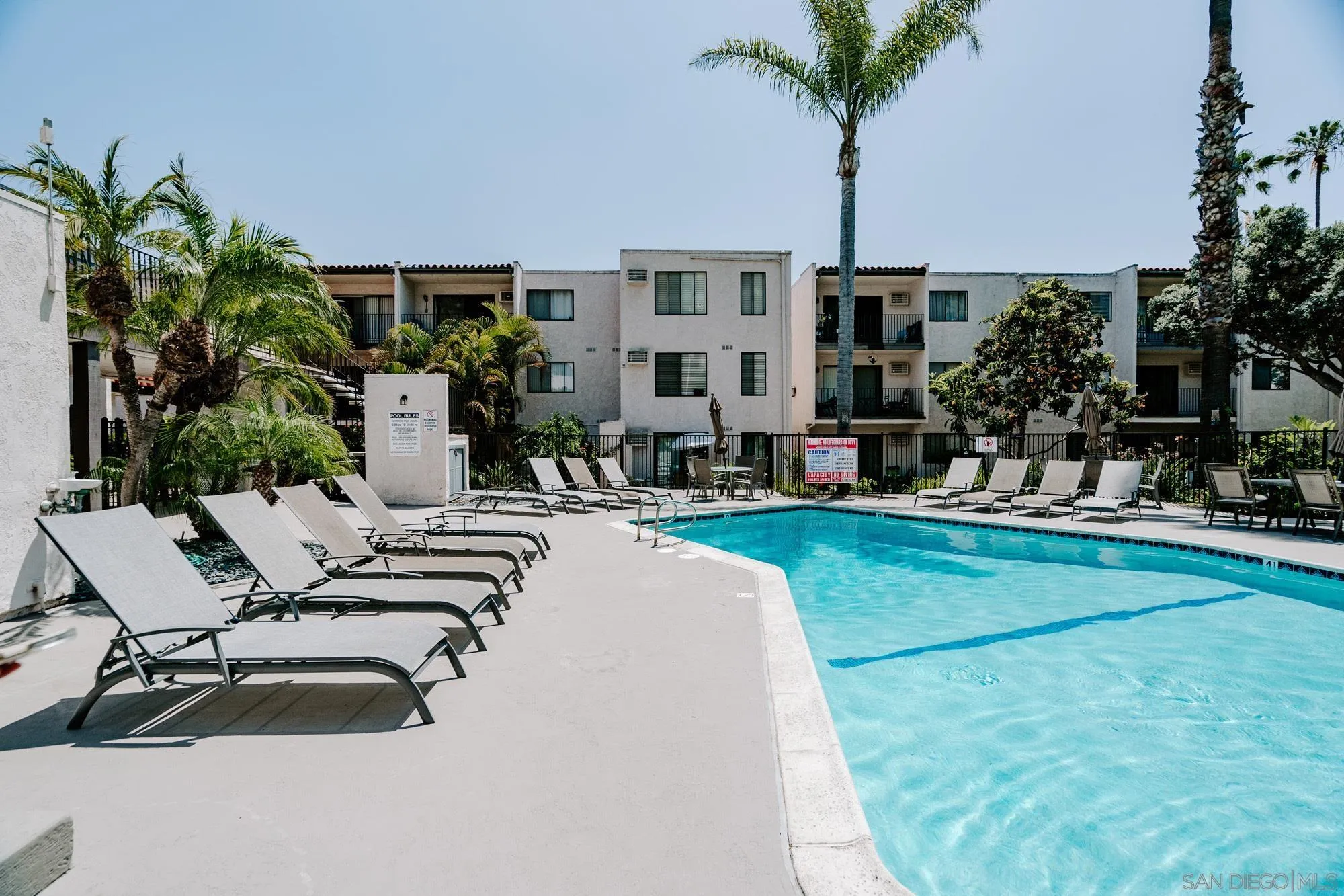 6780 Friars Road, Unit 346 San Diego, CA 92108 - Photo 27 of 29 a view of a house with swimming pool and sitting area