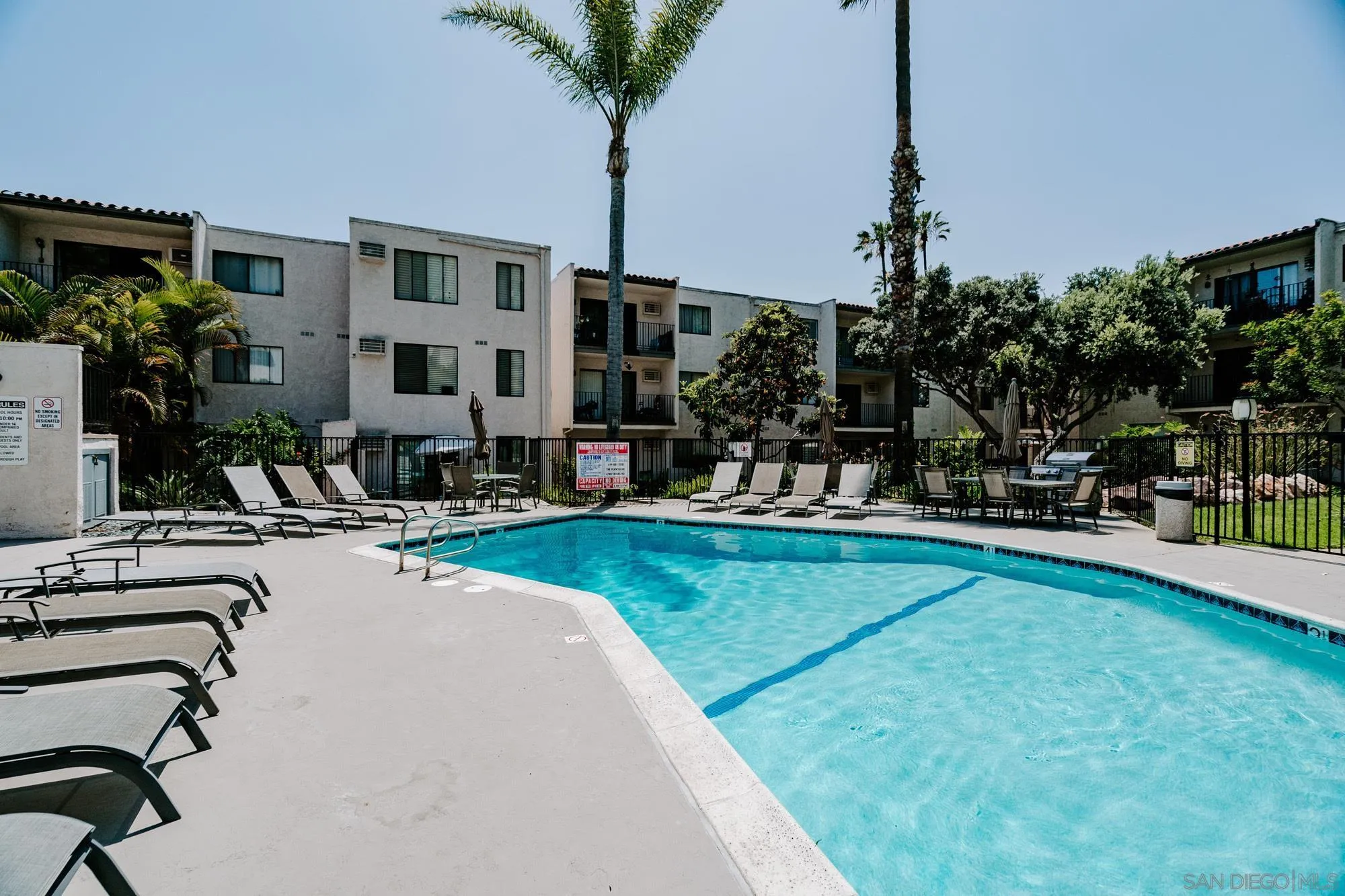 6780 Friars Road, Unit 346 San Diego, CA 92108 - Photo 28 of 29 a view of a house with swimming pool and sitting area