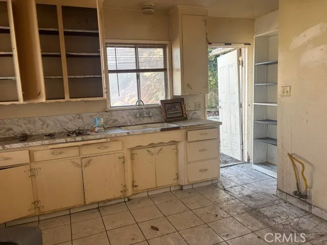 a view of a yard with an outdoor space