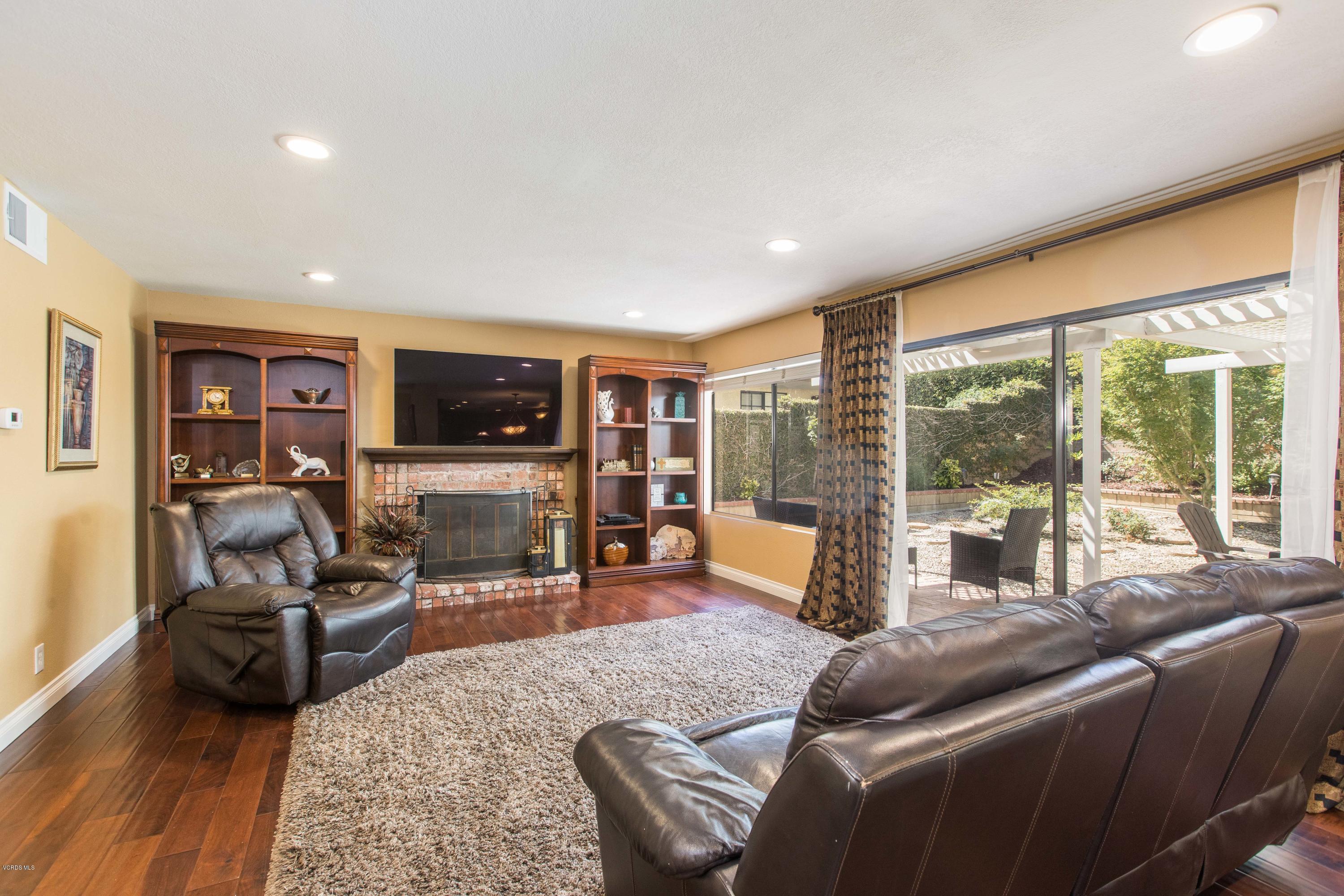 4034 Doneva Road Moorpark, CA 93021 - Photo 18 of 47 a living room with furniture large window and a flat screen tv