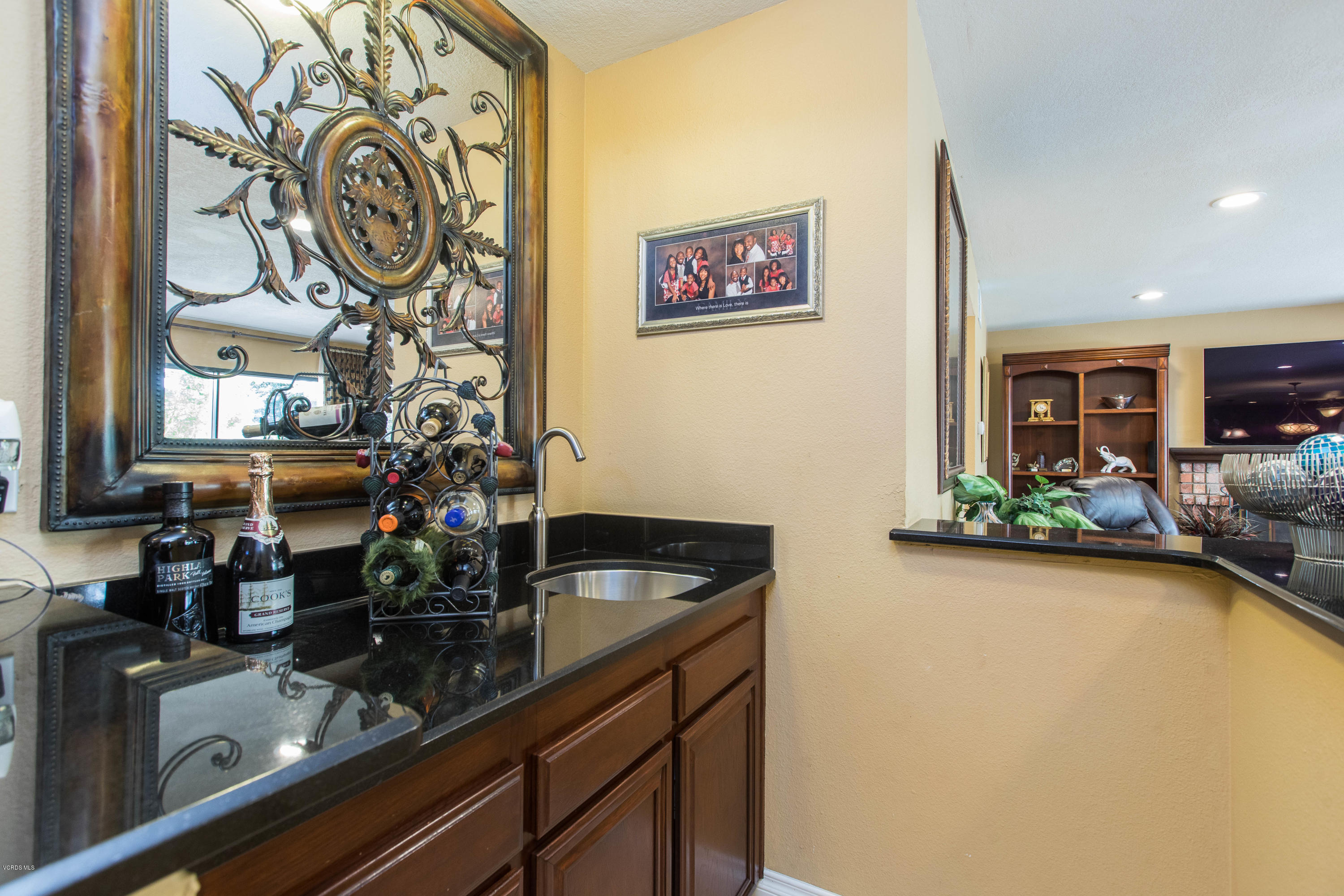 4034 Doneva Road Moorpark, CA 93021 - Photo 21 of 47 a kitchen with a sink and a stove top oven