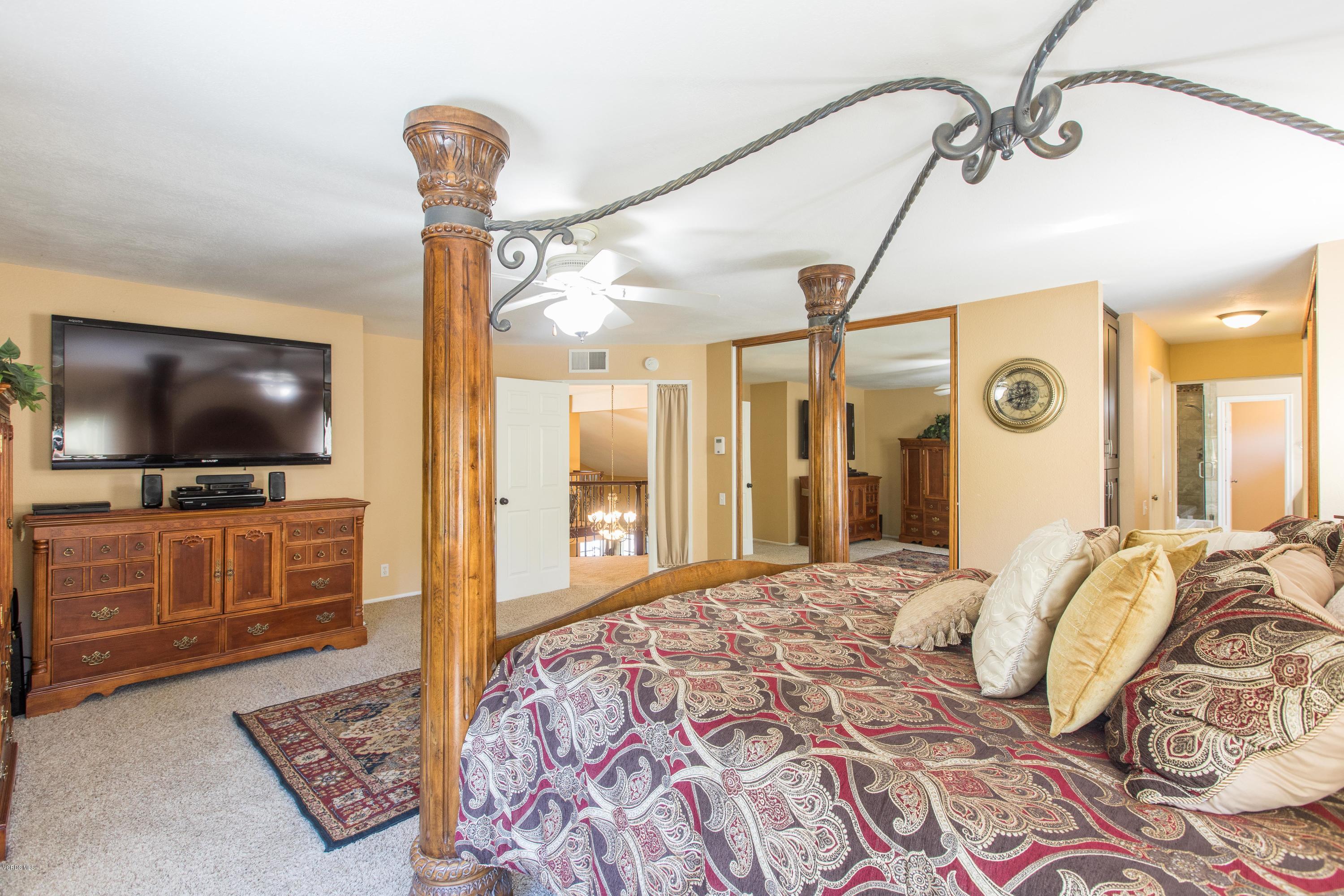 4034 Doneva Road Moorpark, CA 93021 - Photo 28 of 47 a bedroom with a bed and a flat screen tv
