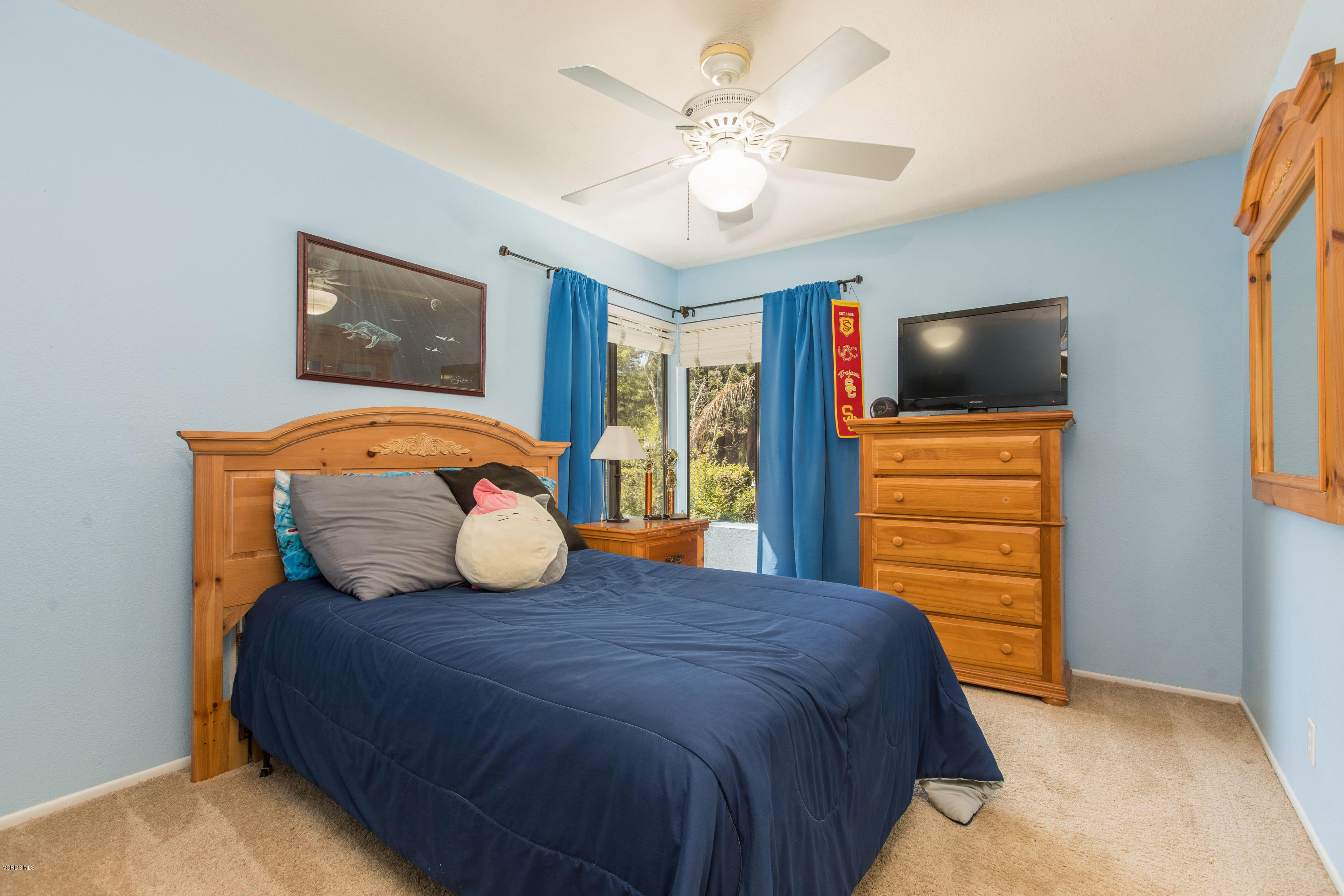 4034 Doneva Road Moorpark, CA 93021 - Photo 30 of 47 a bedroom with a bed and a television