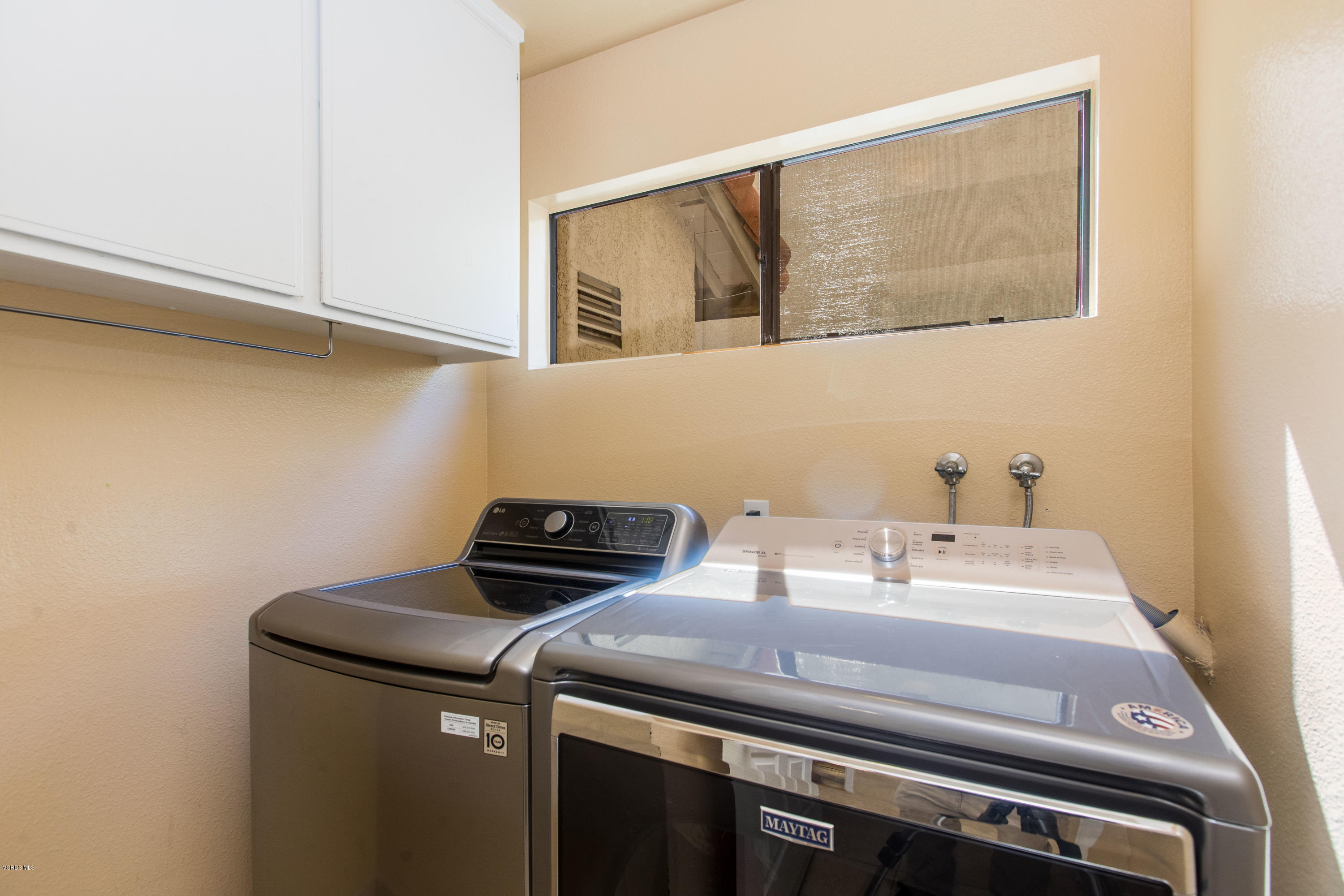 4034 Doneva Road Moorpark, CA 93021 - Photo 32 of 47 a utility room with dryer and washer