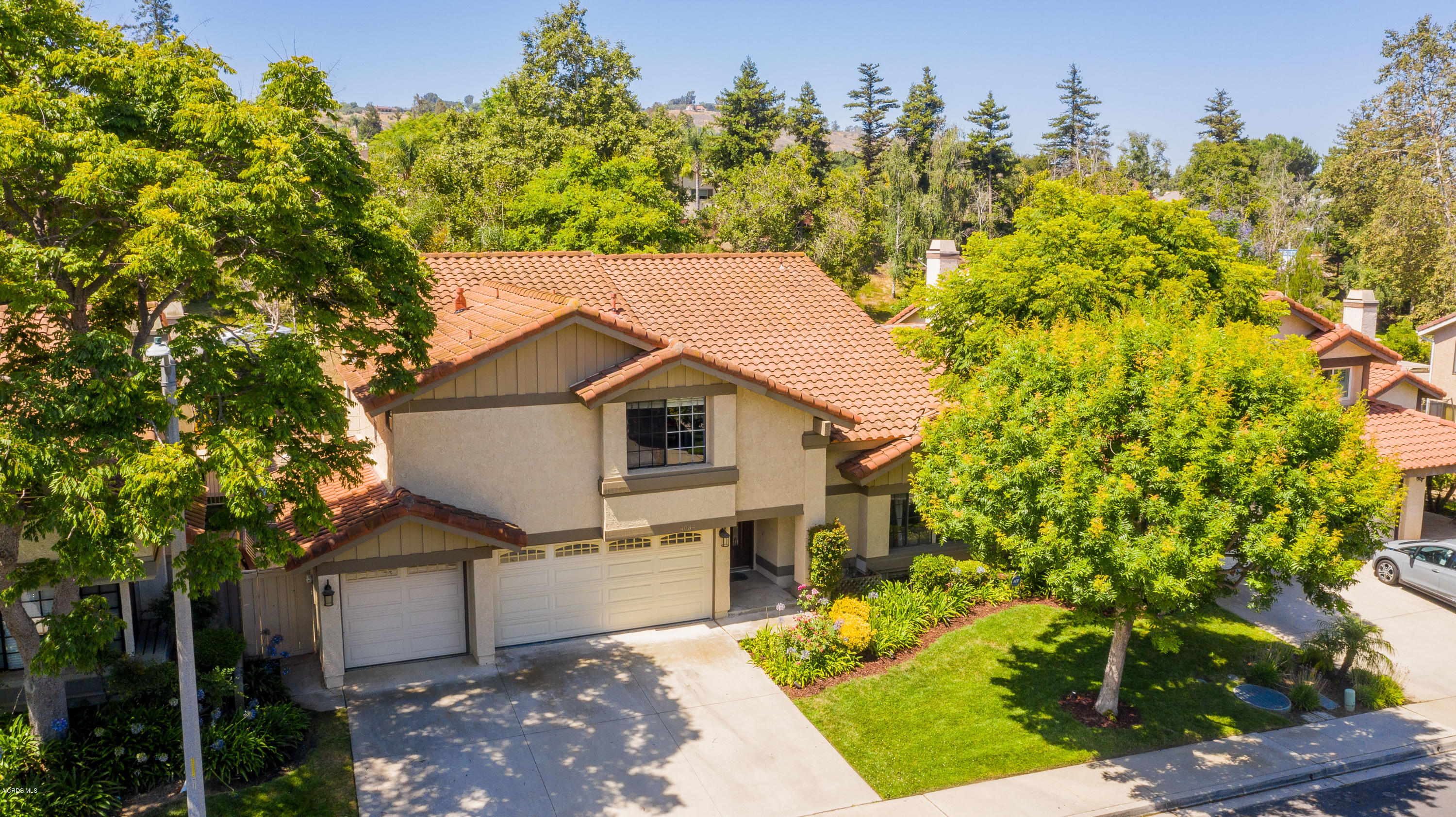 4034 Doneva Road Moorpark, CA 93021 - Photo 33 of 47 a front view of a house with a garden