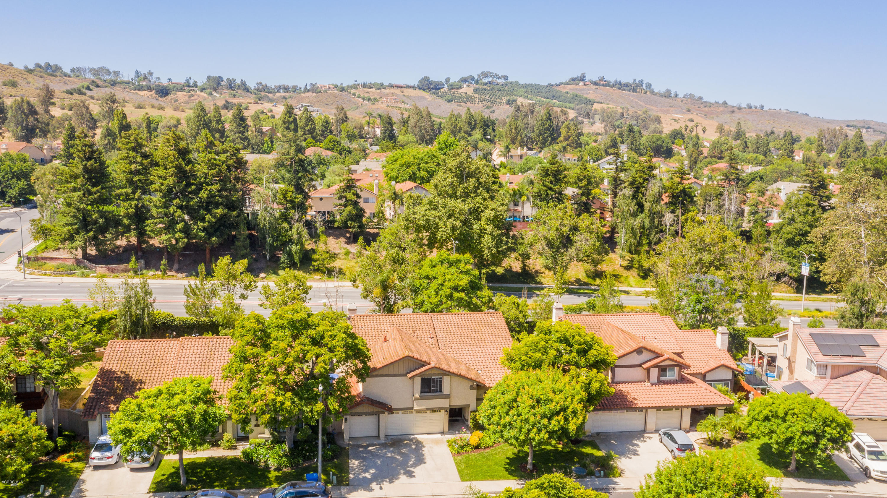 4034 Doneva Road Moorpark, CA 93021 - Photo 34 of 47 an aerial view of residential houses with outdoor space and trees