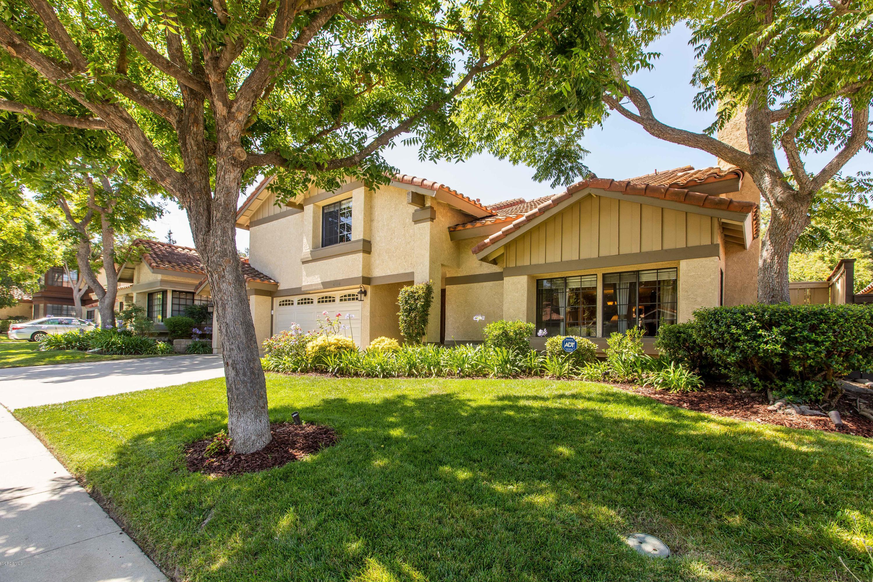 4034 Doneva Road Moorpark, CA 93021 - Photo 40 of 47 a front view of a house with a yard and fountain
