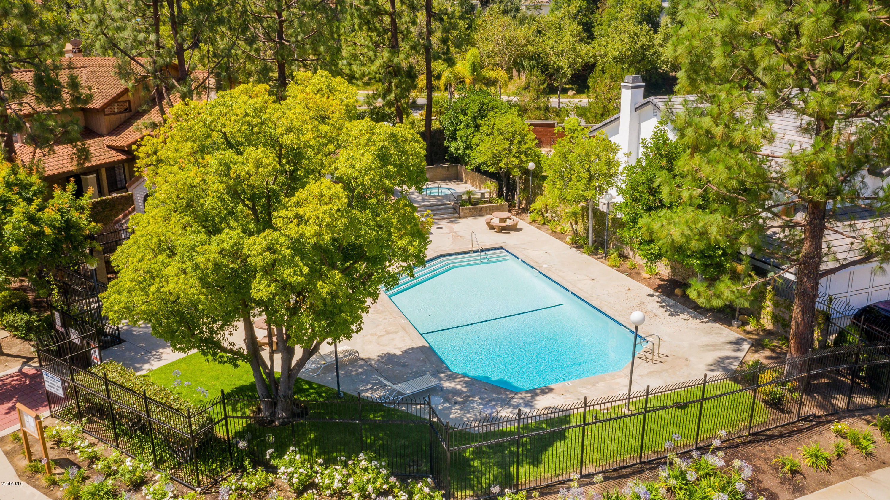 4034 Doneva Road Moorpark, CA 93021 - Photo 42 of 47 an aerial view of a house with swimming pool and large trees