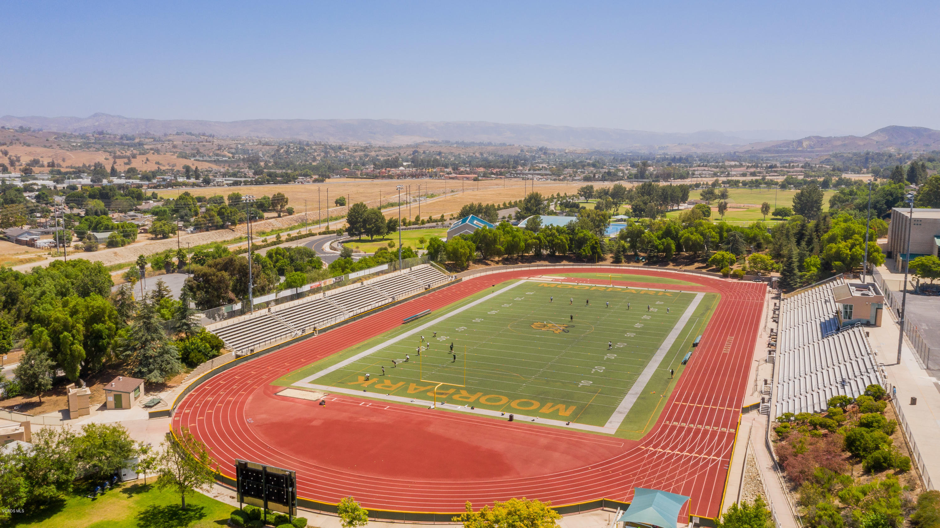 4034 Doneva Road Moorpark, CA 93021 - Photo 45 of 47 a view of a swimming pool and mountains in the background