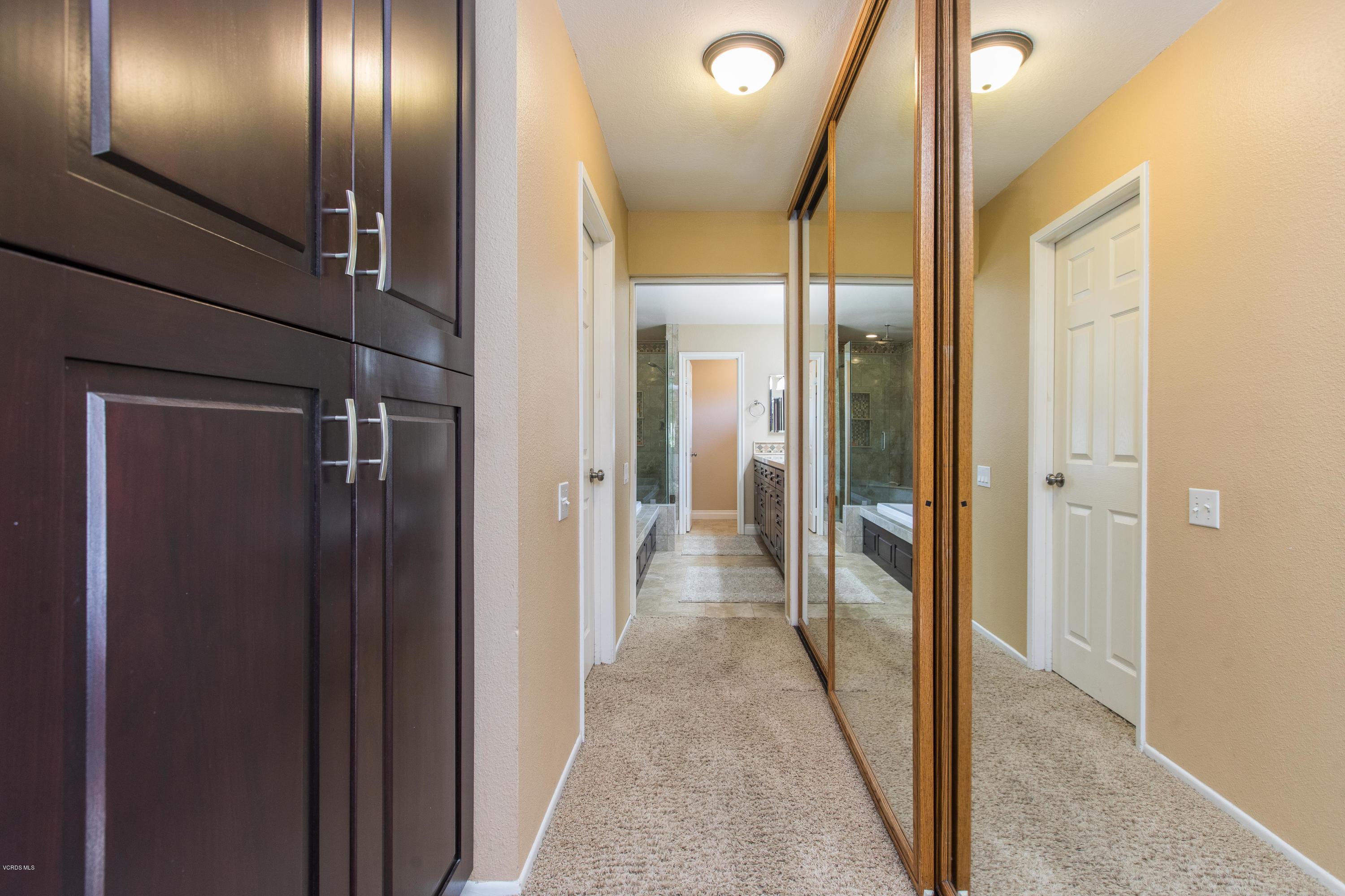 4034 Doneva Road Moorpark, CA 93021 - Photo 7 of 47 a view of a hallway with wooden floor
