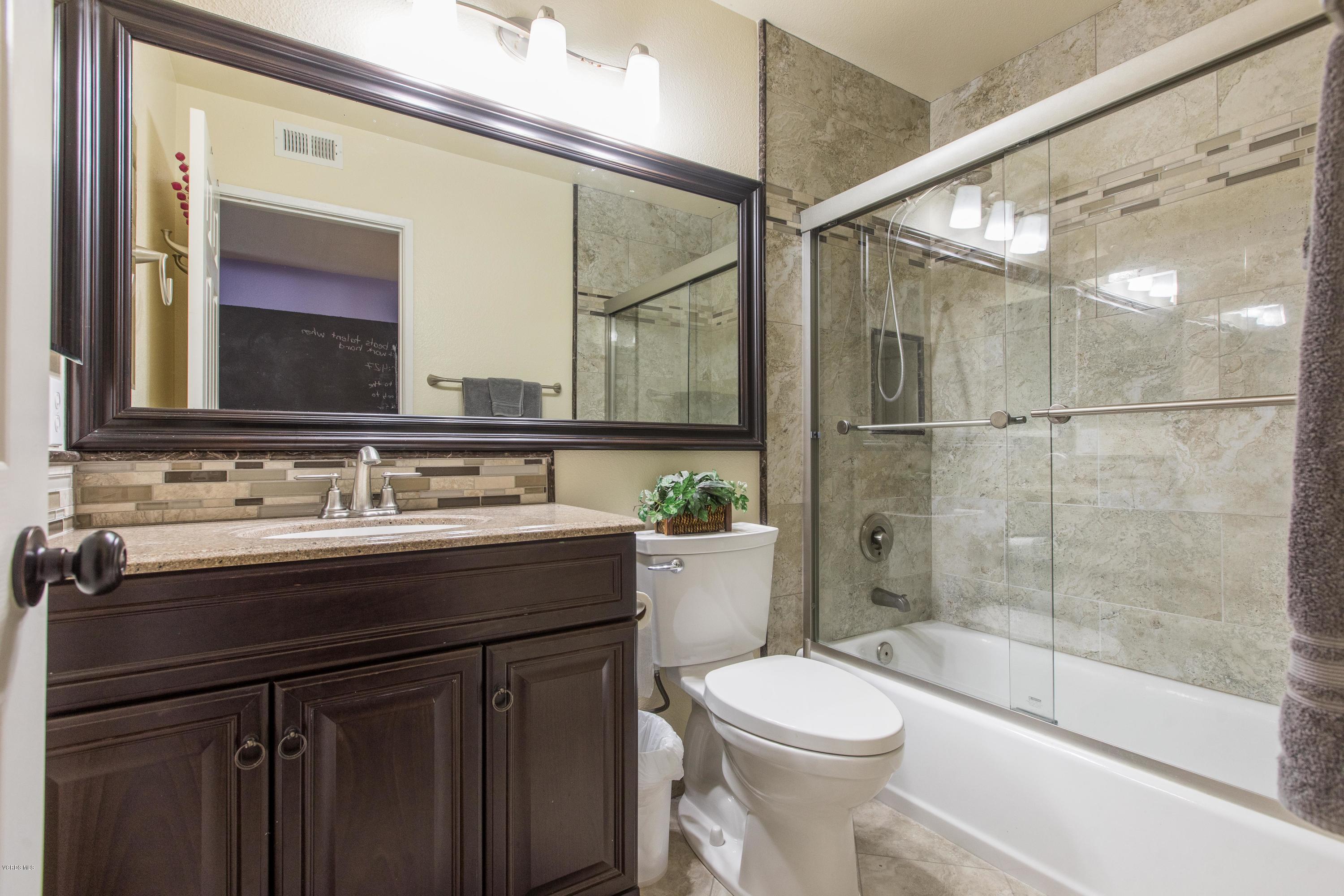 4034 Doneva Road Moorpark, CA 93021 - Photo 9 of 47 a bathroom with a sink a toilet and shower