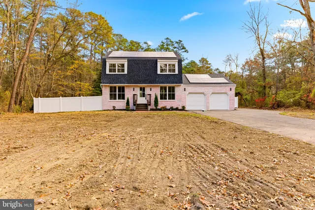 a house view with a outdoor space