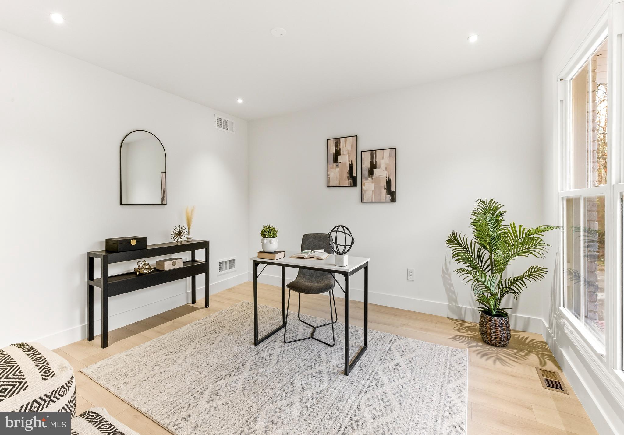 2470 Medford Road Atco, NJ 08004 - Photo 12 of 22 a view of a work space with furniture and a potted plant